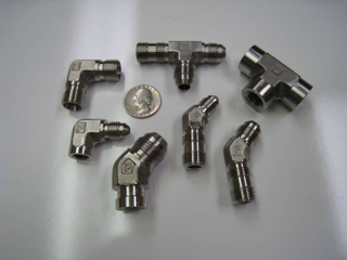Turned connector bodies and fittings